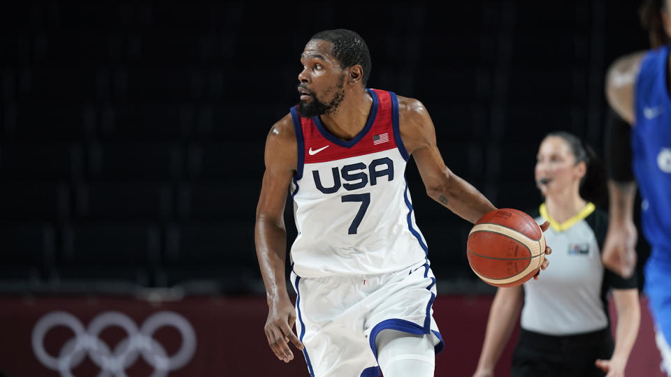 United States's Kevin Durant (7) drives up court during a men's basketball preliminary round game against the Czech Republic at the 2020 Summer Olympics, Saturday, July 31, 2021, in Saitama, Japan. (AP Photo/Charlie Neibergall)