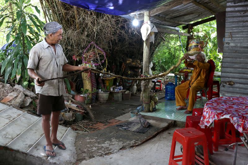 A 92-year-old man shows his five-meter long hair in Vietnam