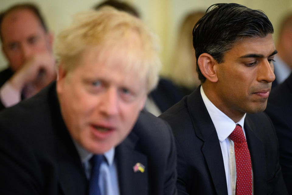 Chancellor of the Exchequer Rishi Sunak (centre) listens as Prime Minister Boris Johnson (left) chairs a Cabinet meeting at 10 Downing Street, London, after he survived an attempt by Tory MPs to oust him as party leader following a confidence vote in his leadership on Monday evening at the Houses of Parliament. Picture date: Tuesday June 7, 2022.