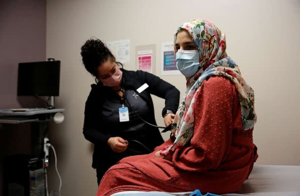 PHOTO: Susan Mohammadi has her blood pressure taken during an OBGYN appointment in Sacramento, Calif., Dec. 28, 2021. (Brittany Hosea-Small/Reuters)