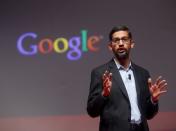Sundar Pichai, Google's senior vice president of products, speaks during a presentation at the Mobile World Congress in Barcelona March 2, 2015. REUTERS/Albert Gea