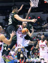 Ginebra's Mark Caguioa loses the ball against the defense of GlobalPort's Japeth Aguilar. (PBA Images)