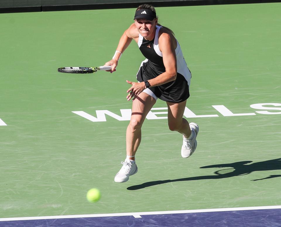 Caroline Wozniacki runs down a shot in her match against Donna Vekic during the BNP Paribas Open in Indian Wells, Calif., March 8, 2024.