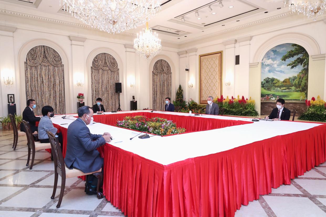 Indonesian Minister of Foreign Affairs Retno Marsudi (second from left) called on Prime Minister Lee Hsien Loong (second from right) on 25 August 2020. (PHOTO: Ministry of Communications and Information)