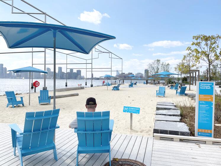 The first manmade beach on Gansevoort Peninsula opened on the Hudson River, New York City. It is located across from the Whitney Museum and near Little Island and has views of the Freedom Tower and the Statue of Liberty. . (Photo by: Deb Cohn-Orbach/UCG/Universal Images Group via Getty Images)