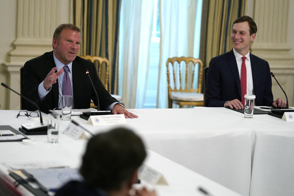 Tilman Fertitta, chairman and CEO of Landry's Inc., speaks during a meeting with restaurant industry executives about the coronavirus response, in the State Dining Room of the White House, Monday, May 18, 2020, in Washington, as White House senior adviser Jared Kushner listens. (AP Photo/Evan Vucci)