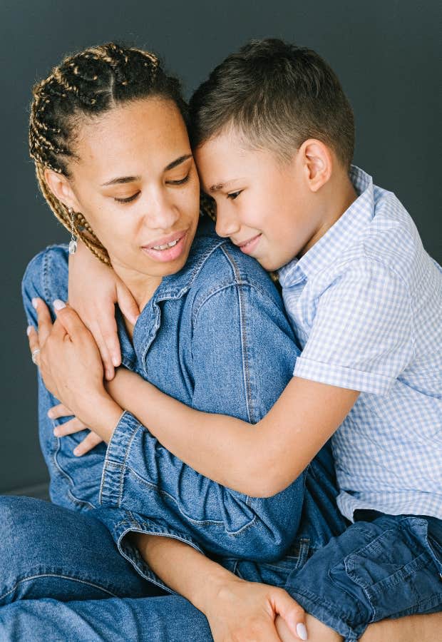 child hugging mom