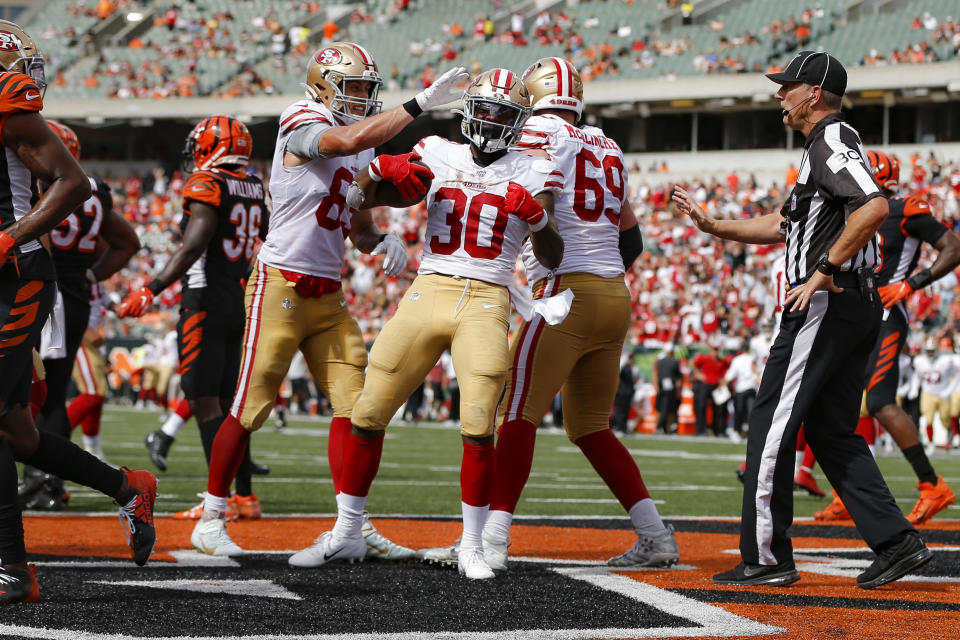 San Francisco 49ers running back Jeff Wilson Jr. (30) celebrates his touchdown during the second half an NFL football game against the Cincinnati Bengals, Sunday, Sept. 15, 2019, in Cincinnati. (AP Photo/Frank Victores)
