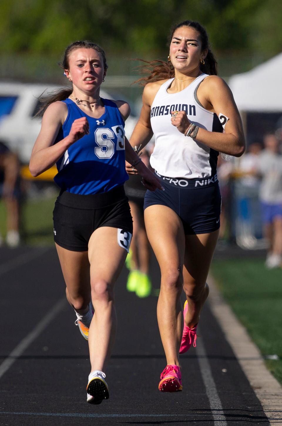 Megan Donlevie of Shore Regional takes the win over Manasquan’s Angelina George in the girls 1600 meter run. Monmouth County Track & Field Championships held at Howell High School. Howell, NJWednesday, May 10, 2023