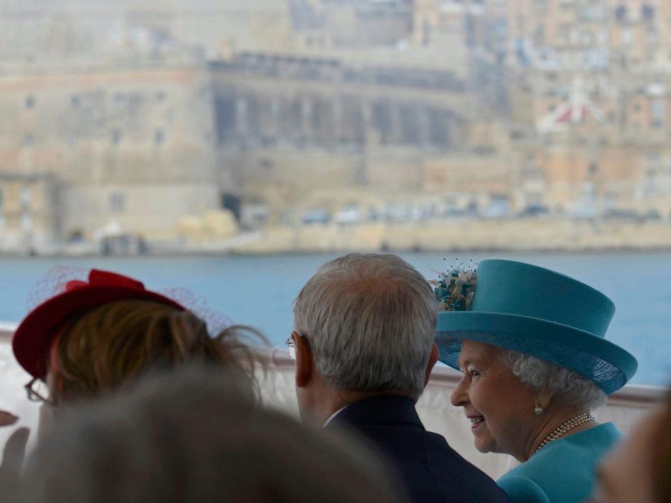 Queen Elizabeth II tours the Grand Harbour in a traditional Maltese fishing boat on November 28, 2015, in Valletta, Malta.