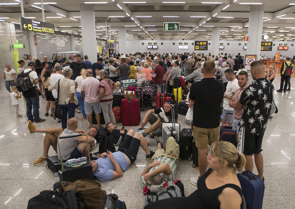 Passengers of British travel group Thomas Cook queue at Son Sant Joan airport in Palma de Mallorca on September 23, 2019. Photo: JAIME REINA/AFP/Getty Images