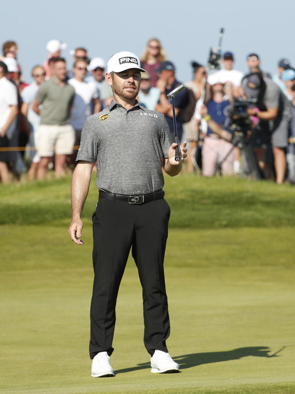 South Africa's Louis Oosthuizen reacts on the 10th green after missing a putt during the final round of the British Open Golf Championship at Royal St George's golf course Sandwich, England, Sunday, July 18, 2021. (AP Photo/Peter Morrison)