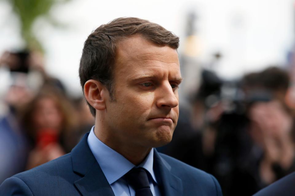 Emmanuel Macron pays respect during a ceremony marking 102nd anniversary of the slaying of Armenians by Ottoman Turks in a brief ceremony, Monday April 24, 2017 in Paris - Credit:  Francois Mori/AP