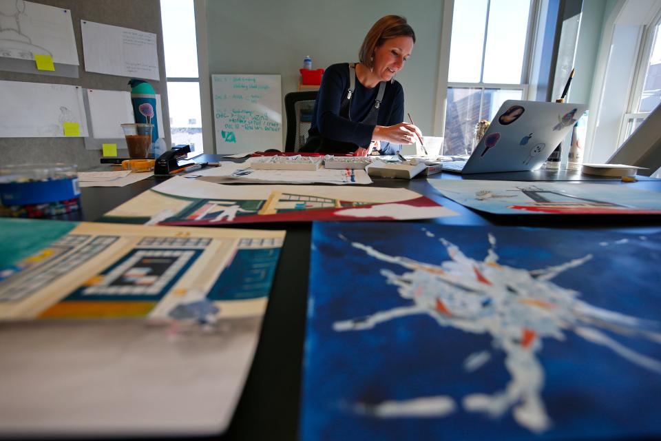 Margo Connolly-Masson works on illustrating the children's book she is authoring featuring Glenn the seagull.