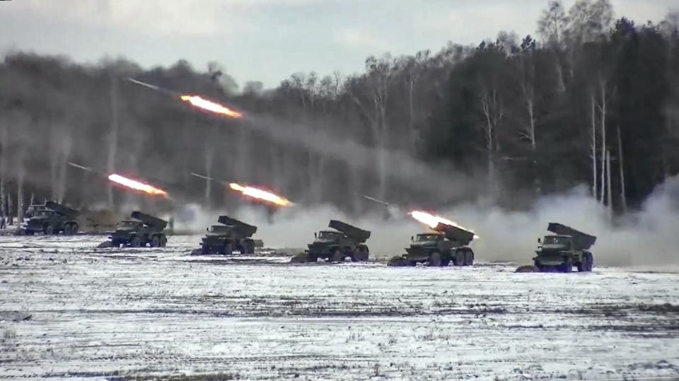 FILE - In this photo taken from video and released by the Russian Defense Ministry Press Service on Friday, Feb. 4, 2022, multiple rocket launchers fire during Belarusian and Russian joint military drills at Brestsky firing range in Belarus. Belarus President Alexander Lukashenko has welcomed thousands of Russian troops to his country, allowed the Kremlin to use it to launch the invasion of Ukraine on Feb. 24, 2022, and offered to station some of Moscow’s tactical nuclear weapons there. But he has avoided having Belarus take part directly in the fighting – for now. (Russian Defense Ministry Press Service via AP, File)