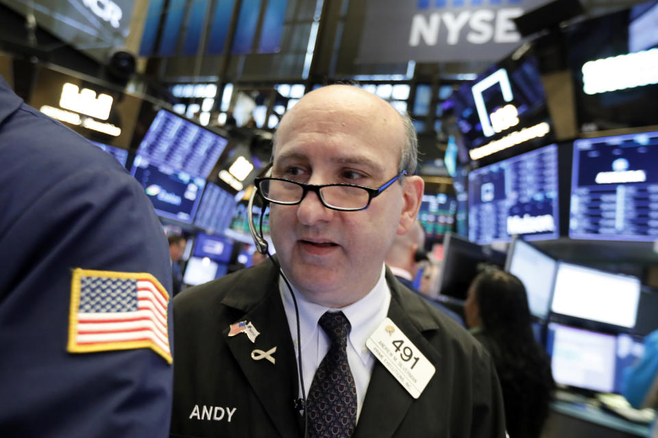 Trader Andrew Silverman works on the floor of the New York Stock Exchange, Wednesday, Nov. 7, 2018. Stocks are climbing in early trading on Wall Street as results of the U.S. midterm elections came in as investors had expected. (AP Photo/Richard Drew)