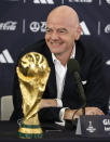 FIFA President Gianni Infantino answers questions during a 2026 soccer World Cup news conference Thursday, June 16, 2022, in New York. (AP Photo/Noah K. Murray)