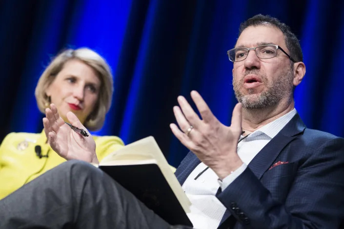 Andy Slavitt, former administrator of the Centers for Medicare and Medicaid Services, talks as Dr. Rebekah Gee, secretary of the Louisiana Department of Health, looks on at a health care panel discussion.