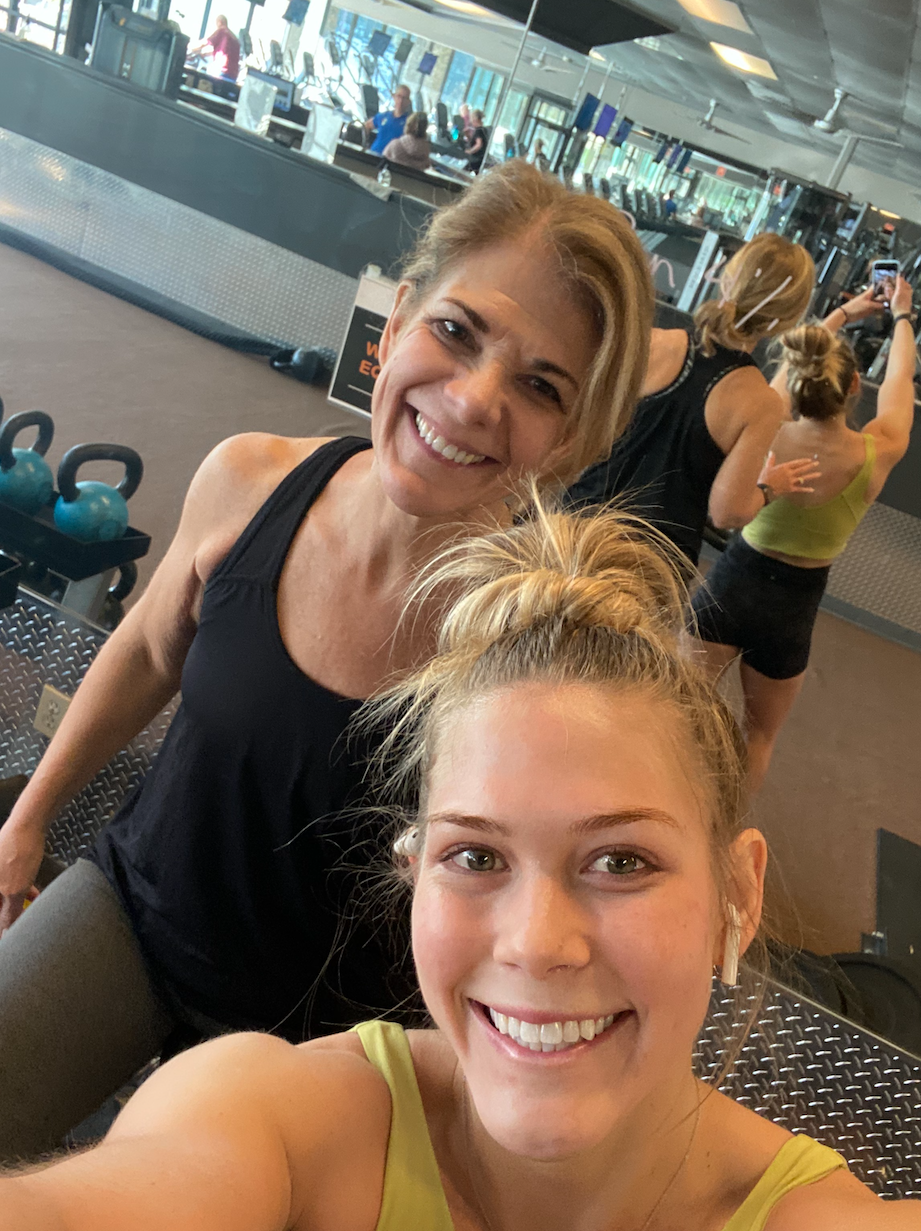 a couple of women posing for the camera