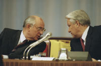 FILE - Soviet President Mikhail Gorbachev, left, and Russian Federation President Boris Yeltsin confer during a meeting of the Congress of People's Deputies on Monday, Sept. 2, 1991, in Moscow, Russia. Gorbachev said Yeltsin was a driving force behind the collapse of the Soviet Union. (AP Photo/Alexander Zemlianichenko, File)