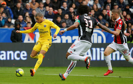 Soccer Football - Ligue 1 - OGC Nice vs Paris St Germain - Allianz Riviera, Nice, France - March 18, 2018 Paris Saint-Germain’s Kylian Mbappe in action REUTERS/Jean-Paul Pelissier