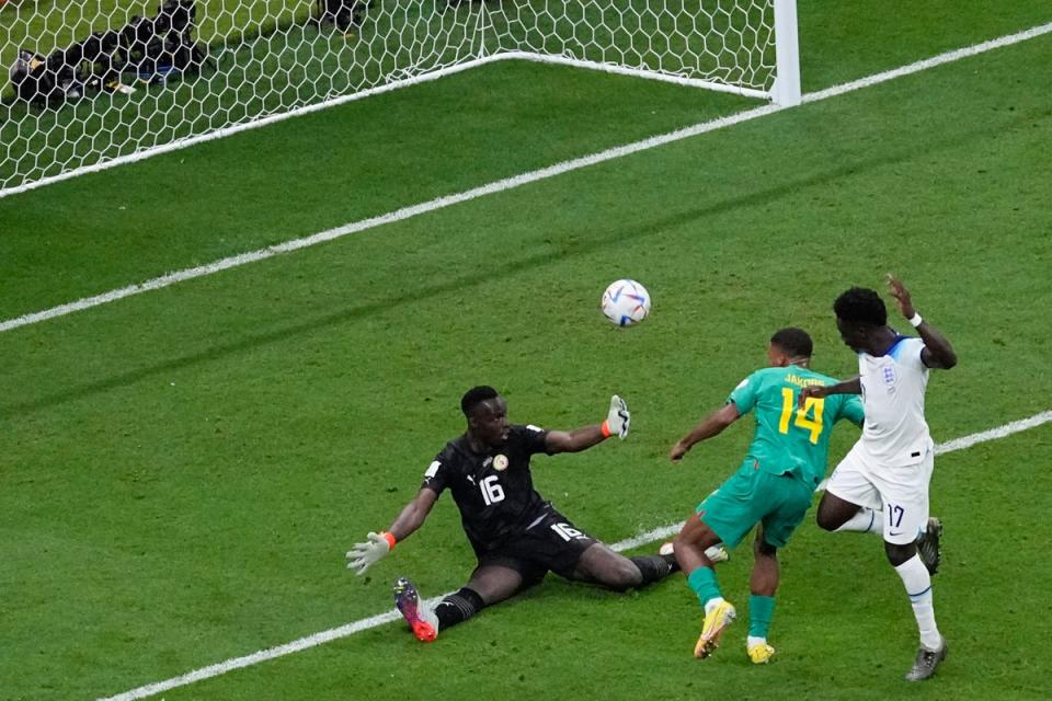 Bukayo Saka scores England’s third goal of the match (AP)