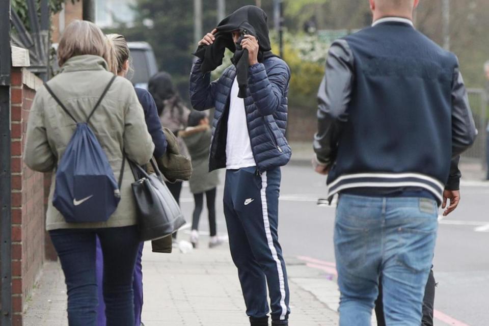 James Neves, 22 (centre), leaves Croydon Magistrates' Court, where he is amongst a group charged with violent disorder (PA)