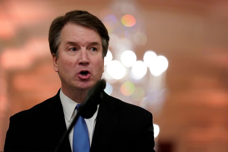 FILE PHOTO: U.S. Supreme Court Associate Justice Brett Kavanaugh speaks during his ceremonial public swearing-in, in the East Room of the White House in Washington