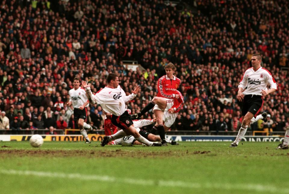 <p>Solskjaer avoids a challenge from Jamie Carragher to net the late winner. (Press Association) </p>