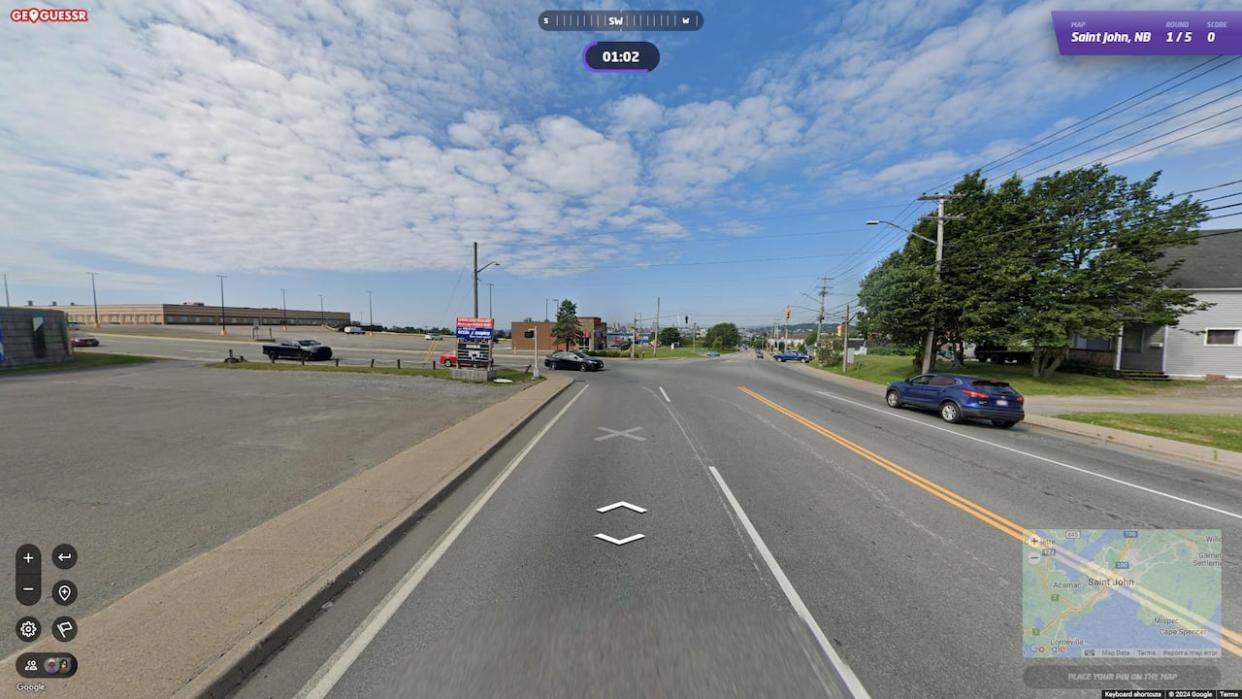 Teacher Paul Adams says he will sometimes select specific maps, such as Charlotte County, so his students can get acquainted with their own surroundings. This screenshot from GeoGuessr was taken on Loch Lomond Road on a Saint John map. (Submitted by Paul Adams - image credit)
