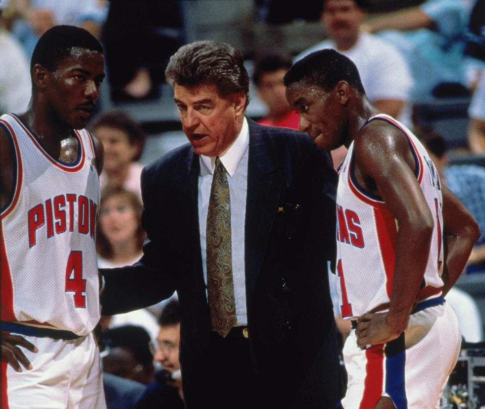 Joe Dumars Chuck Daly and Isiah Thomas