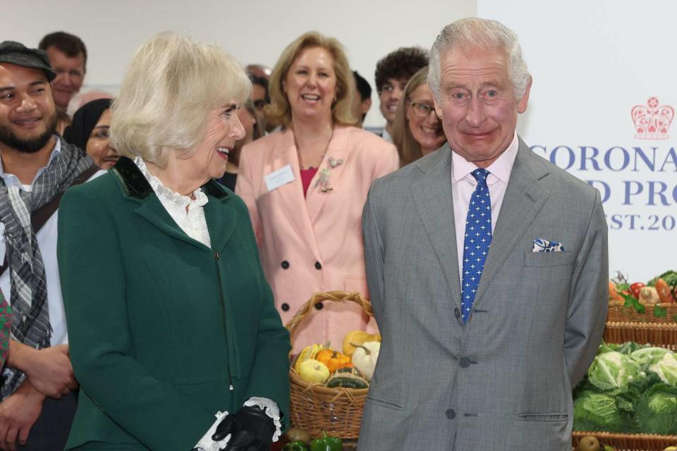 <p>Ian Vogler - WPA Pool/Getty</p> Queen Camilla and King Charles at the launch of the Coronation Food Project in Didcot on November 14.