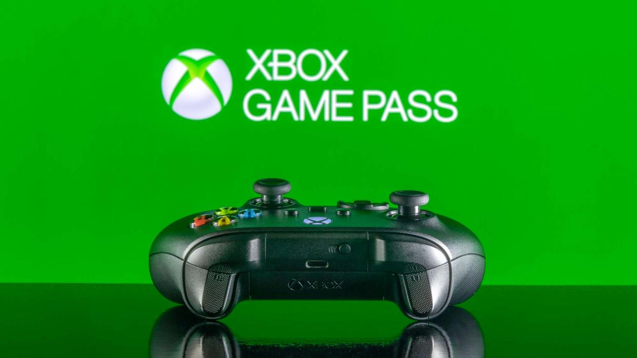  Xbox Game Pass logo above an Xbox controller 