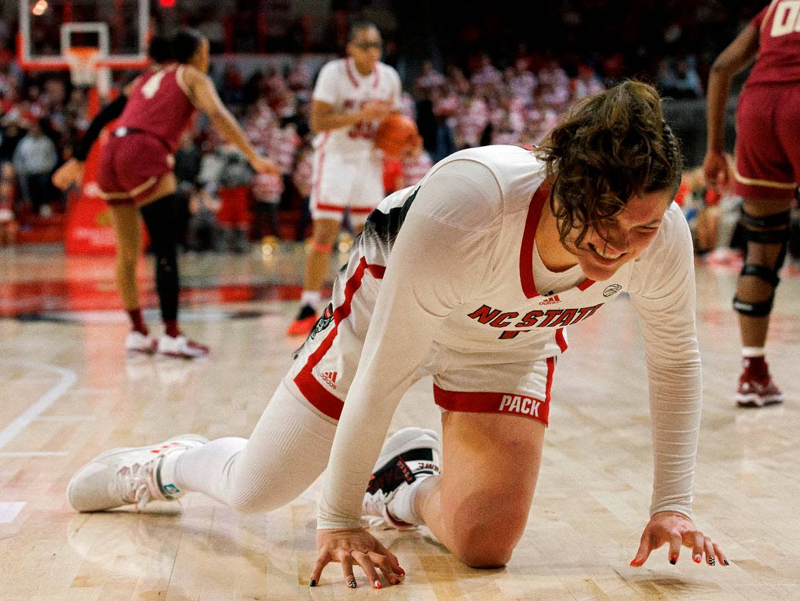 N.C. State’s River Baldwin grimaces after suffering an apparent injury during the second half of the Wolfpack’s 88-80 win over Florida State on Thursday, Jan. 4, 2023, at Reynolds Coliseum in Raleigh, N.C. Kaitlin McKeown/kmckeown@newsobserver.com