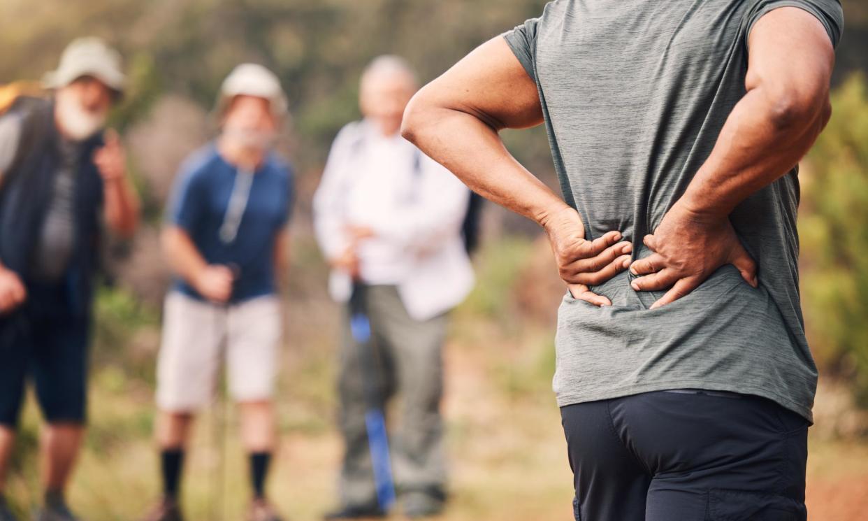 <span>Researchers say the ability of ‘nocebo’ effects to spread to others may have implications for medical treatment such as group exercise for back pain.</span><span>Photograph: PeopleImages/Getty Images</span>