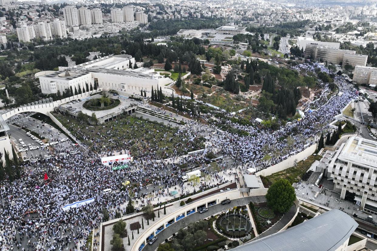 Israelis protest against Prime Minister Benjamin Netanyahu's judicial overhaul plan outside the parliament in Jerusalem, March 27, 2023. <a href="https://newsroom.ap.org/detail/APTOPIX%20Israel%20Politics/81b873e7160c42609d9a49fd200f5b62?Query=Israel%20&mediaType=photo&sortBy=arrivaldatetime:desc&dateRange=now-24h&totalCount=127&currentItemNo=25" rel="nofollow noopener" target="_blank" data-ylk="slk:AP Photo;elm:context_link;itc:0;sec:content-canvas" class="link ">AP Photo</a>