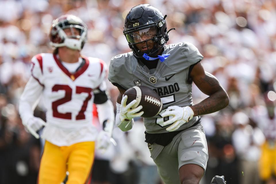Colorado Buffaloes wide receiver Jimmy Horn Jr. (5) runs the ball in for a touchdown in the second quarter of the game against the USC Trojans at Folsom Field on Sept. 30, 2023, in Boulder. Mandatory Credit: Chet Strange-USA TODAY Sports
