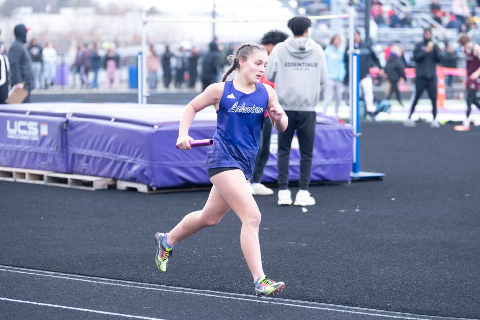 Lakeview sophomore Lilamae Frank races in the 3200 meter relay event during the Lakeview Track and Field Invitational at Lakeview High School on Friday, April 5, 2024.