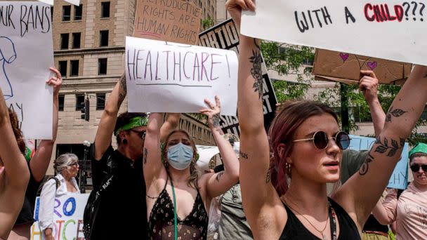 PHOTO: Protesters hold placards expressing their opinion at a pro abortion rights rally in Dayton, Ohio, May 14, 2022. (SOPA Images/LightRocket via Getty Images, FILE)