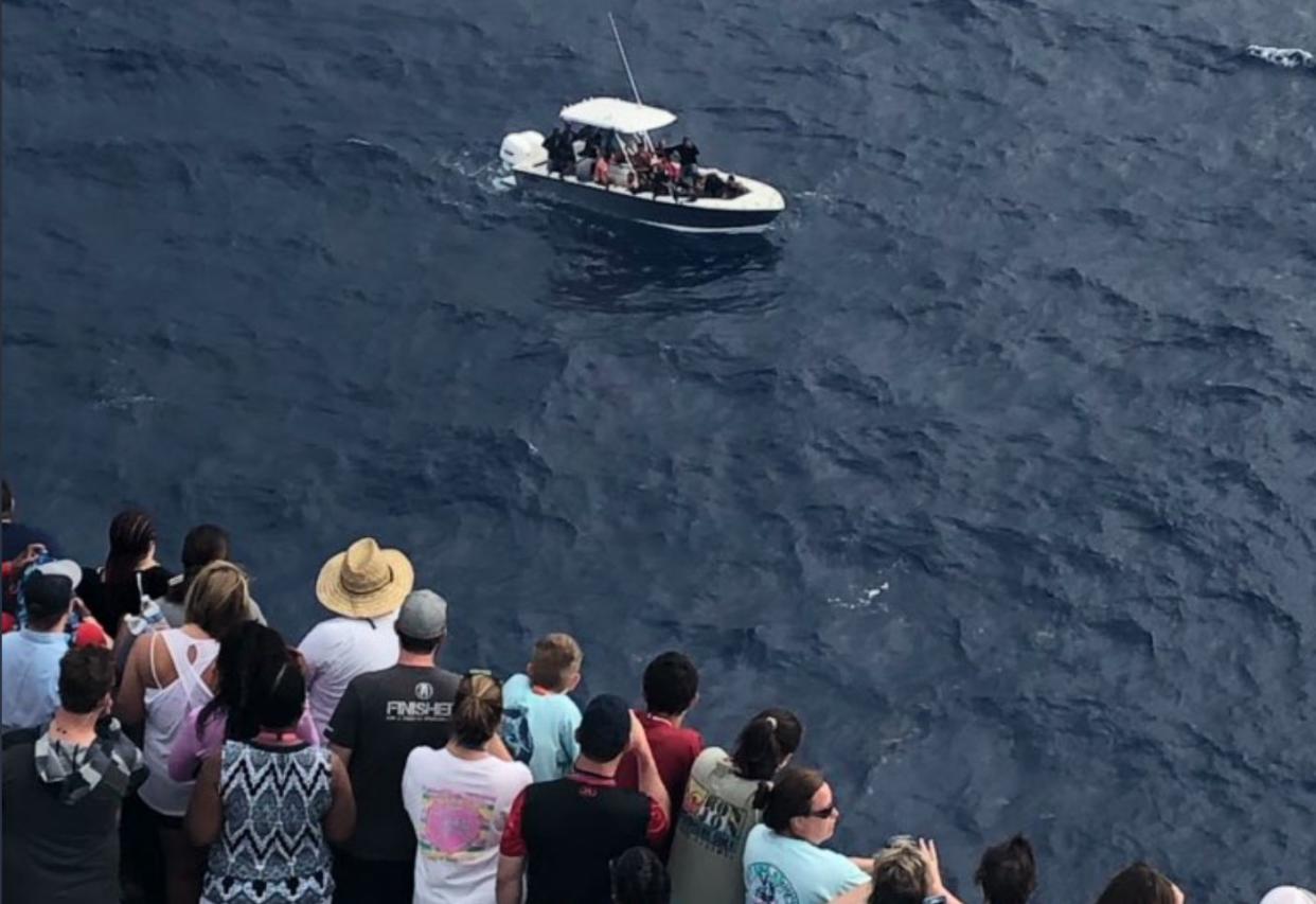 The Carnival Fantasy helped Coast Guard rescue 23 people adrift at sea for over three days as passengers looked on. (Photo: Twitter)