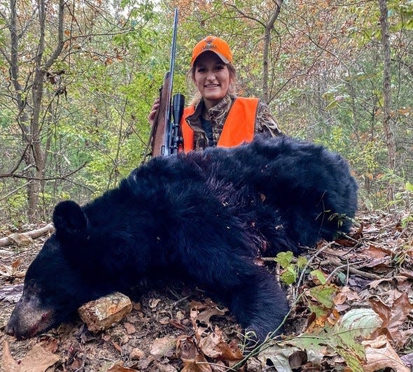 Kelsie Wikoff, of Hume, on her harvest of this 268-pound boar (male bear) in Zone 1 during Missouri’s first bear-hunting season.