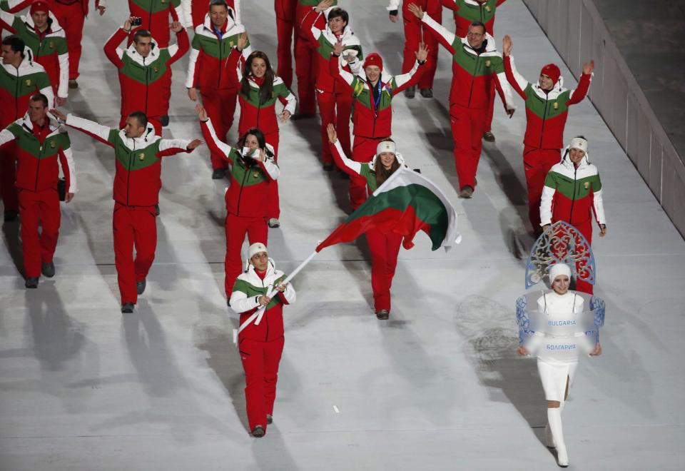 Bulgaria's flag-bearer Maria Kirkova leads her country's contingent during the opening ceremony of the 2014 Sochi Winter Olympics, February 7, 2014. REUTERS/Lucy Nicholson (RUSSIA - Tags: OLYMPICS SPORT)