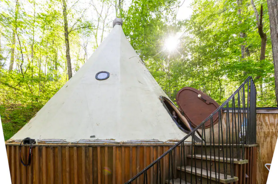The Treetop tipi Airbnb is located in Marshall, North Carolina.