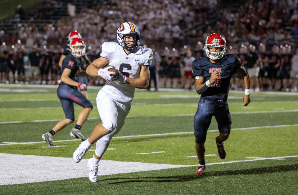 Republic TE James Rexroat hauls in a catch and runs during the Tigers matchup at Ozark on August 31, 2023.