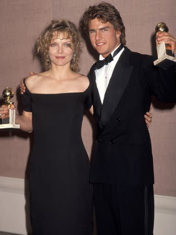 <p>Jim Smeal/Ron Galella Collection via Getty </p> Michelle Pfeiffer and Tom Cruise in 1990