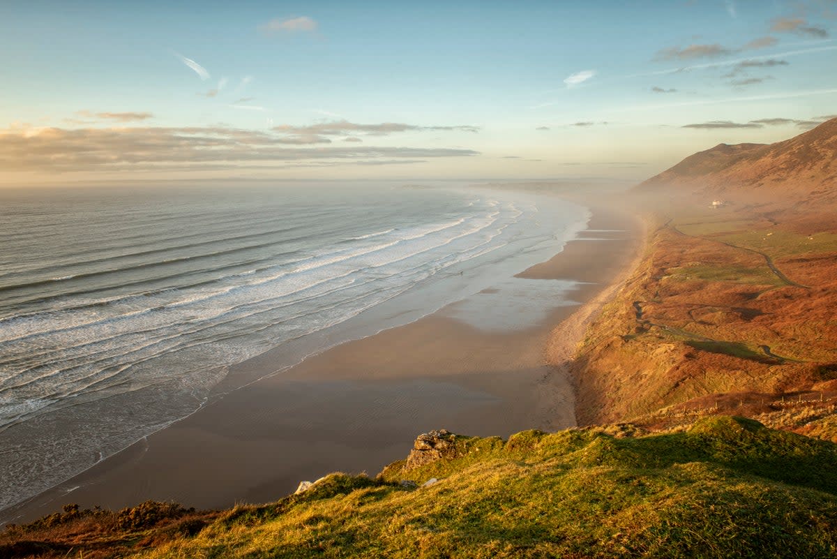 Rhossili Bay is one of the country’s most scenic beaches (Getty Images/iStockphoto)