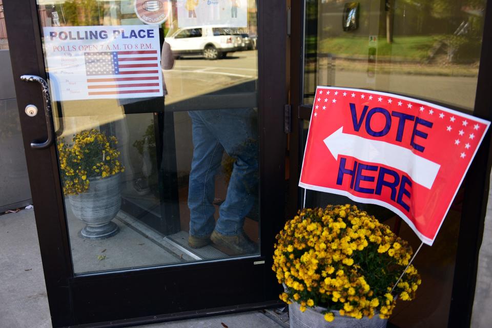 A voter heads into the polling place at the Monaca Library Tuesday afternoon.