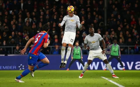 Chris Smalling of Manchester United heads it home - Credit: Action Plus