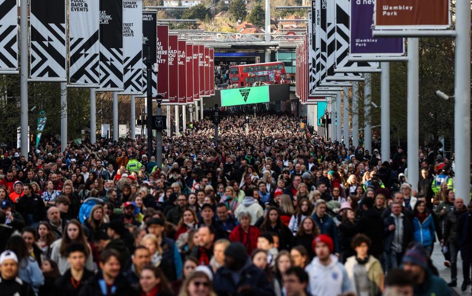 Fans arrive at Wembley - AFP/Adrian Dennis