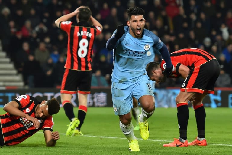 Manchester City's striker Sergio Aguero (2nd R) celebrates after scoring their second goal during the English Premier League football match between Bournemouth and Manchester City at the Vitality Stadium on February 13, 2017